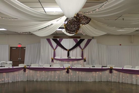 Purple Tables Backdrop Ceiling Arrangement